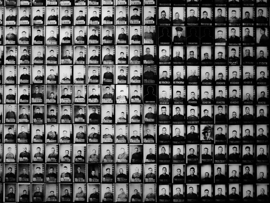 P1050972.jpg - A section of the wall of photo IDs of the 2,600 prisoners of war  held in POW camps in Borneo and the fittest were sent to their death by the Japanese on the gruelling 260km Sandakan-Ranau jungle "death march" in Borneo in 1945. Only 6 survived.