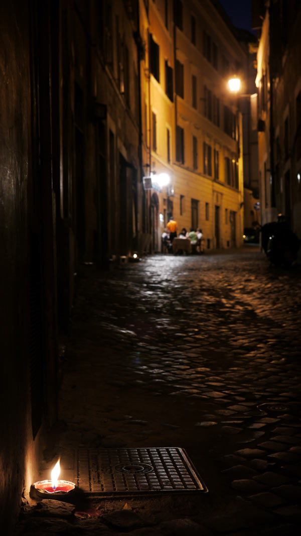 A cafe at night in Rome