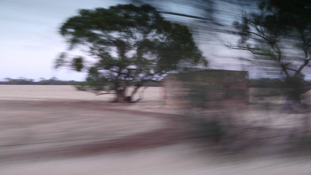 P1030891.jpg - There are many 150 year old abandoned sandstone rural buildings in the Southern Flinders Ranges district of Sth Australia - so many, I had to resort to shots at 110kph.