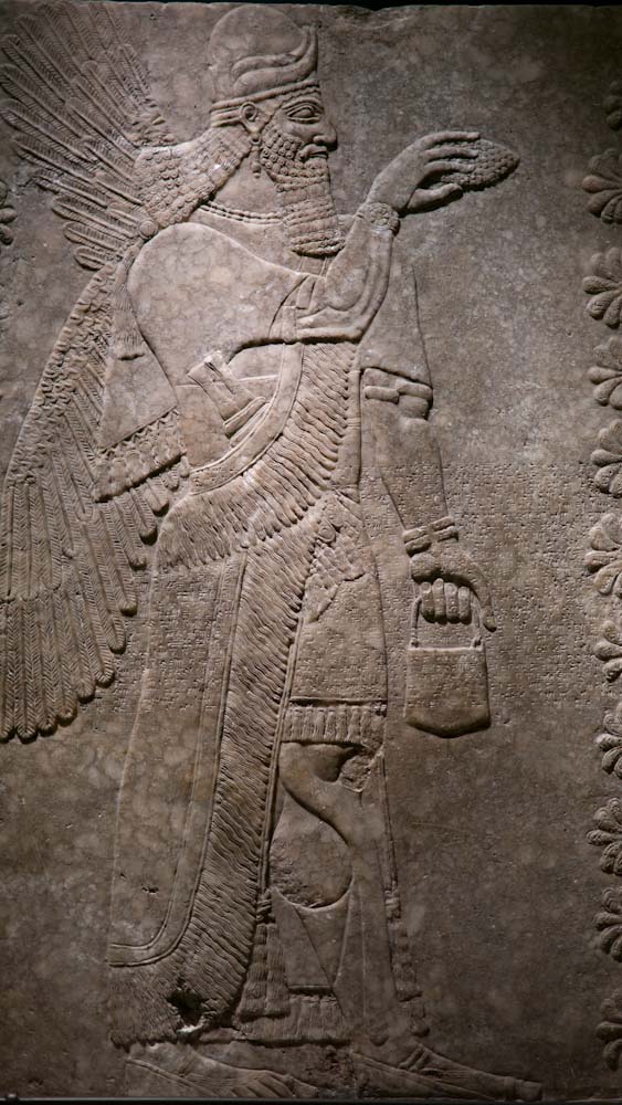 P1150331-1.JPG - Winged genie with horned helmet. Neo-Assyrian Period. c883 BC - part of a quite extensive ancient Egyptian collection at this musuem.