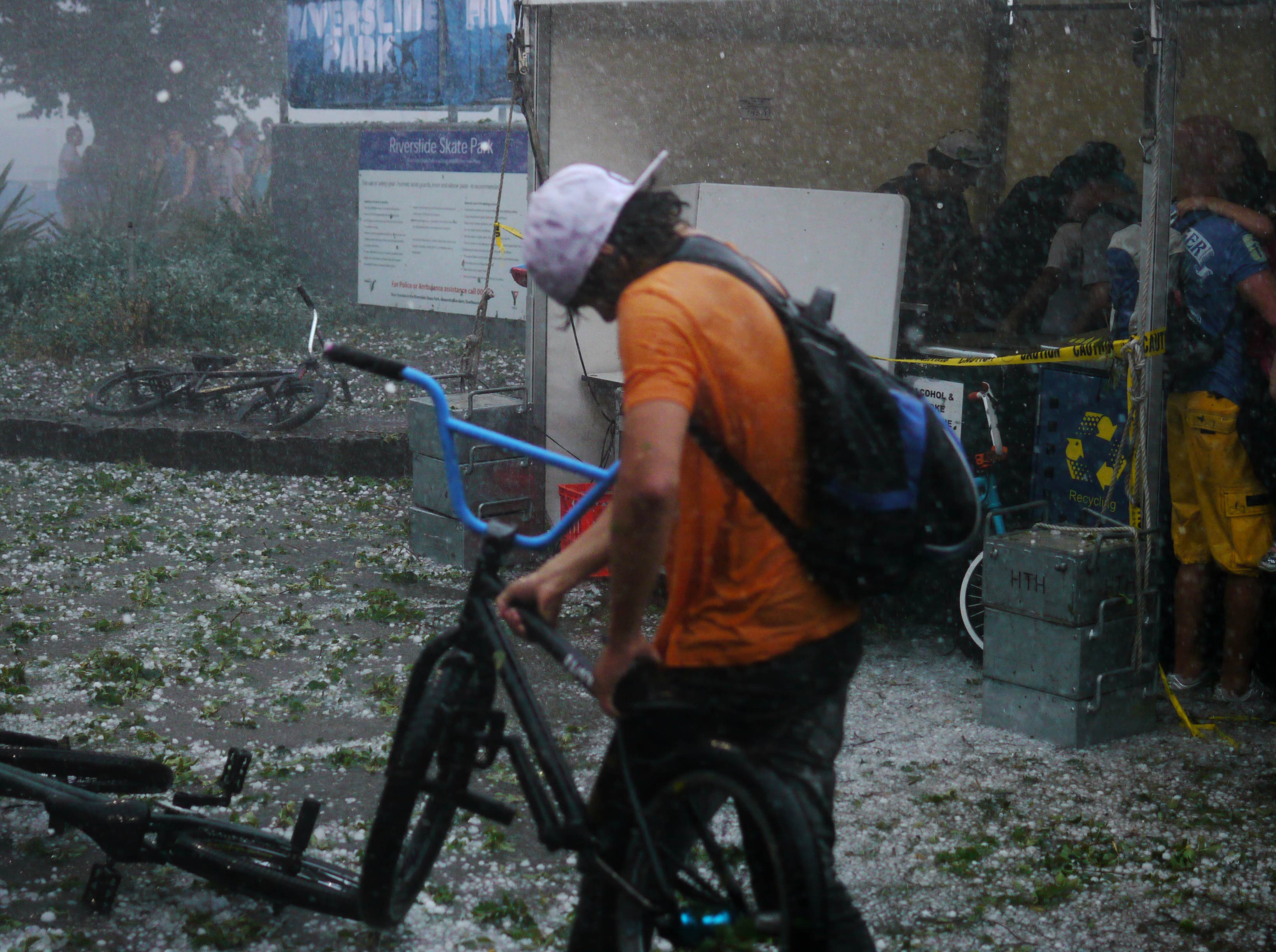 P1060592.jpg - The mini-cyclone force winds combined with the large hailstones to spread debris and made walking only for the adventurous or desperate.